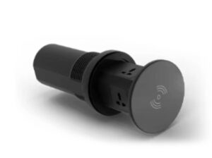 Pop-up conference table connectivity box with hidden power, USB, and AV ports emerging from the tabletop.