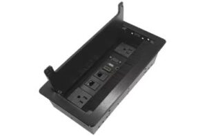 Flip-open embedded tabletop module with concealed power and data ports, shown in the open position on a conference table.